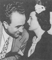 Mary Astor conferring with her attorney—Roland Rich Woolley (Hearst Newspaper Collection, University of Southern California Library)