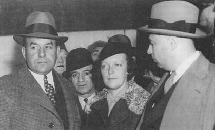 Vera Stretz (center) shown with her attorney Samuel Leibowitz (right) leaving court after her arraignment on murder charges for shooting Dr. Fritz Gebhardt. (AP/Wide World Photos)