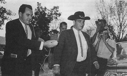 Ku Klux Klansman, Collie Leroy Wilkins (center) arriving at court. (AP/Wide World Photos)