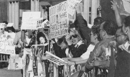 Fans of slain music star Selena wait outside the courthouse for the sentence of convicted killer Yolanda Saldivar. (AP/Wide World Photos)